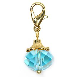 Dangle dorado piedra azul rey